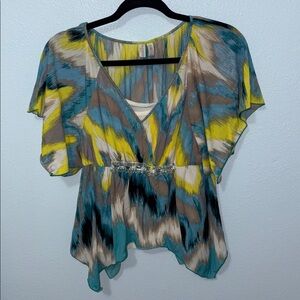🛍️ MADISON multi colored top perfect for spring. PS